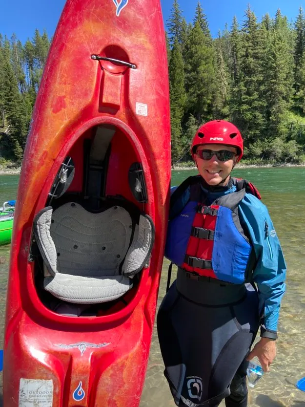 Boy kayaking on the Snake River