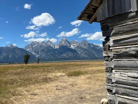 Historic T.A. Moulton Barn on Mormon Row with Grand Teton mountain range in the background