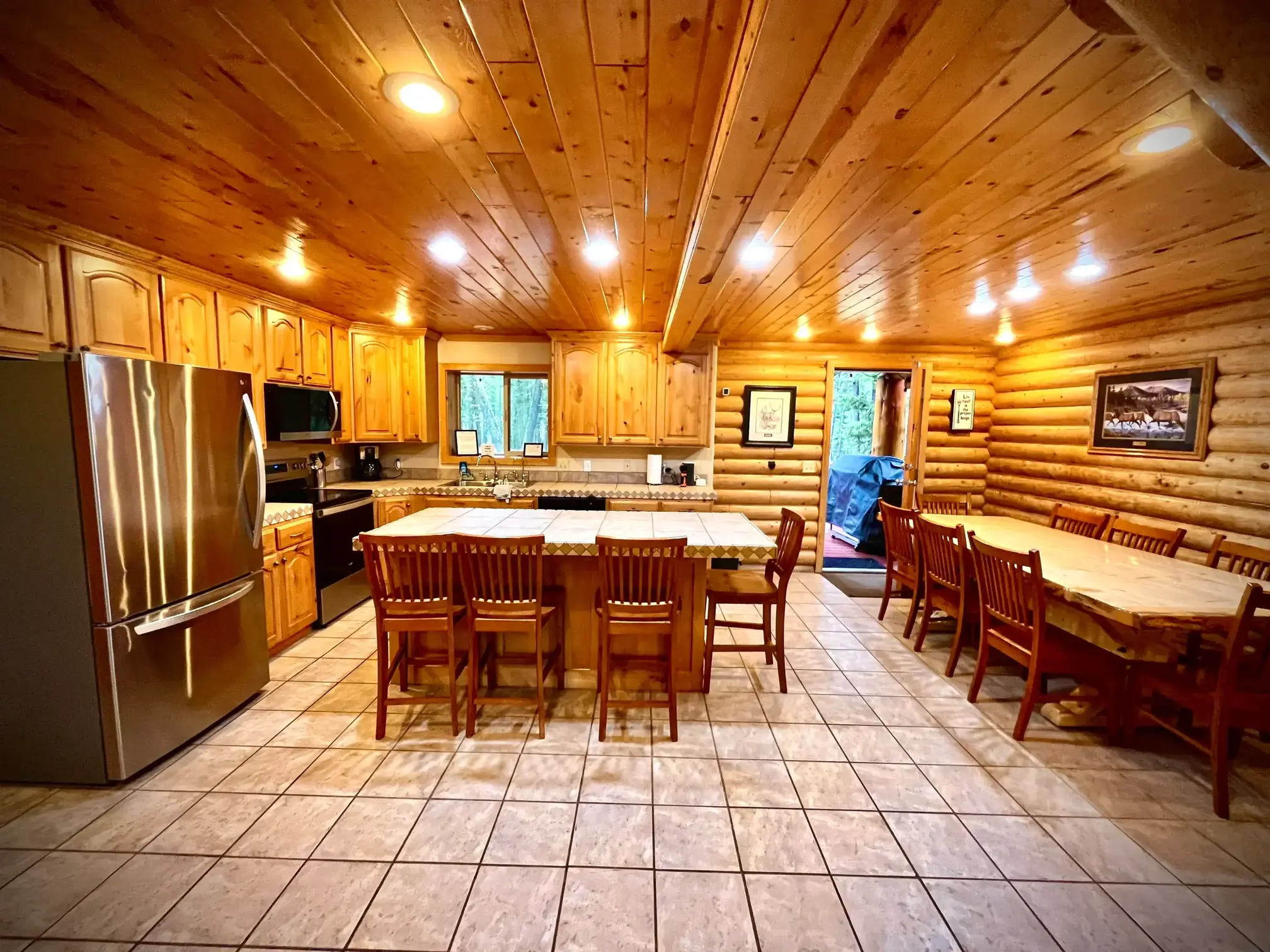 Well-stocked kitchen with modern appliances and cookware