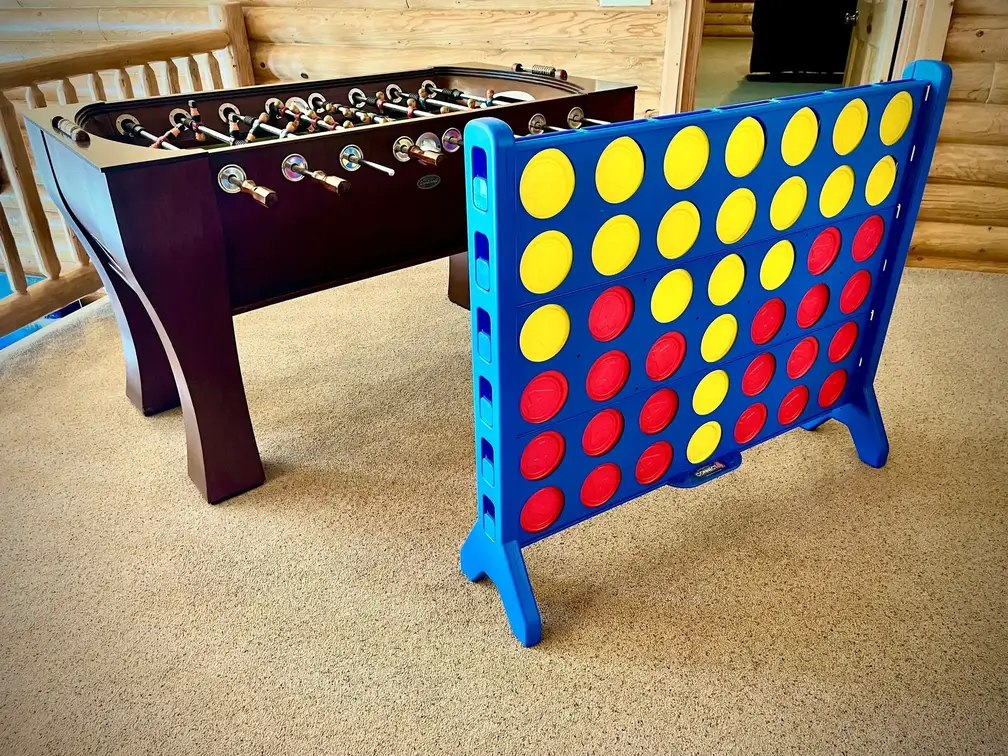 Foosball table, an arcade game, and a life-size Connect 4 for fun, friendly competition