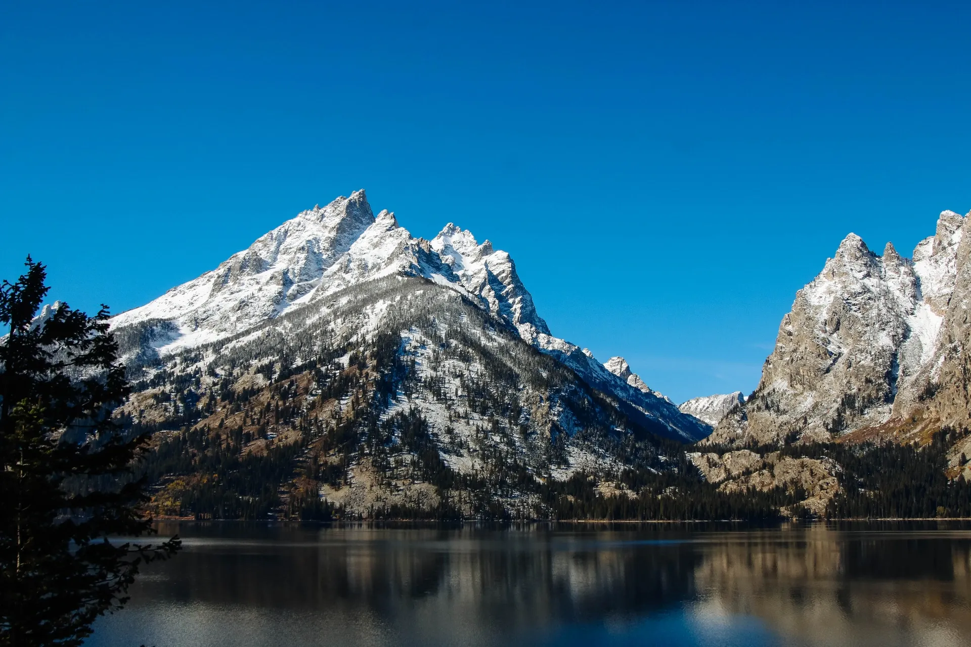 Jenny Lake with Teton Range reflected in calm water