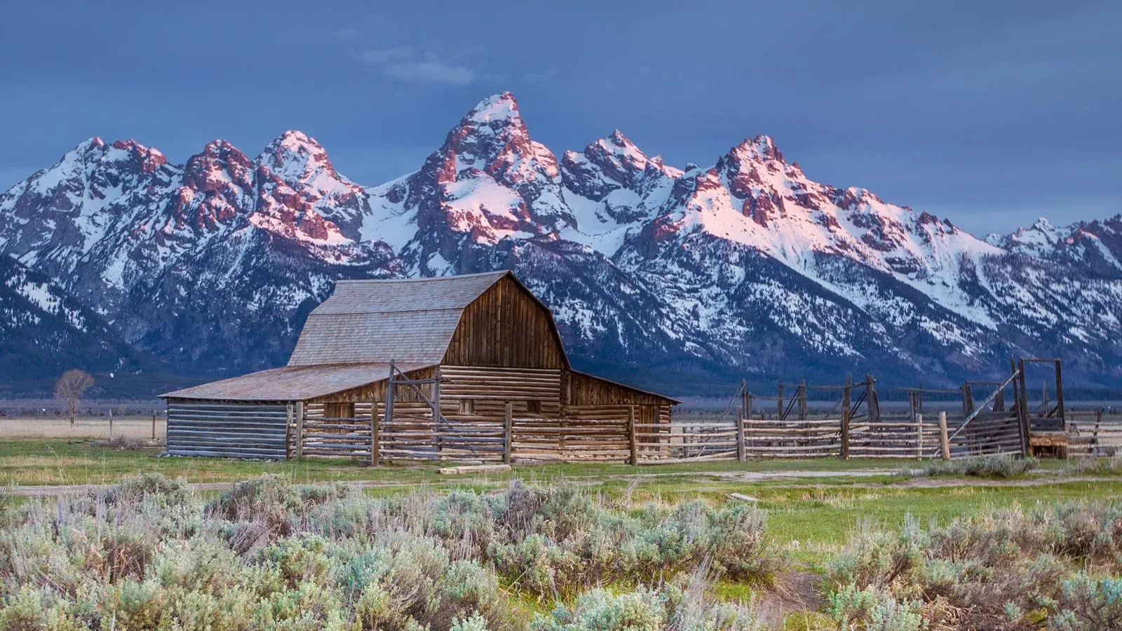 John Moulton Barn with Grand Teton range in background